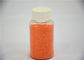 L'orange tachette les taches colorées de base de sulfate de sodium dans la poudre détersive